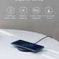 Anker PowerWave Wireless Charger Pad charging smartphone and earbuds wirelessly with universal compatibility and through-case charging features