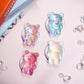 On The Grip Magnetic 3D Gummy Bear Style Expandable Collapsible Mobile Phone Grip Stand Holder for Smartphone Tablet Cell Phone Accessory (Matte Holographic)