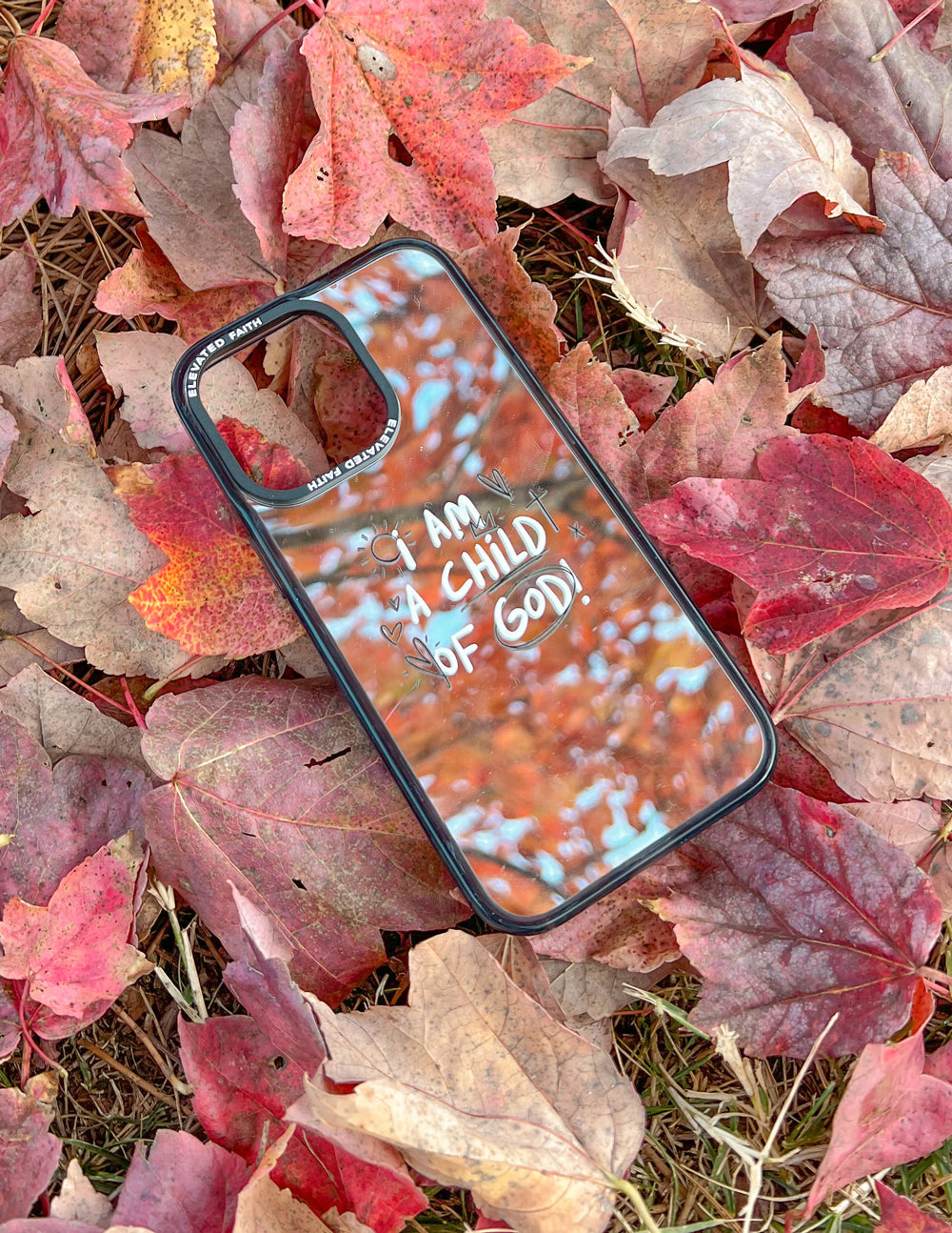 Child of God Mirror iPhone case with engraved scripture and protective design
