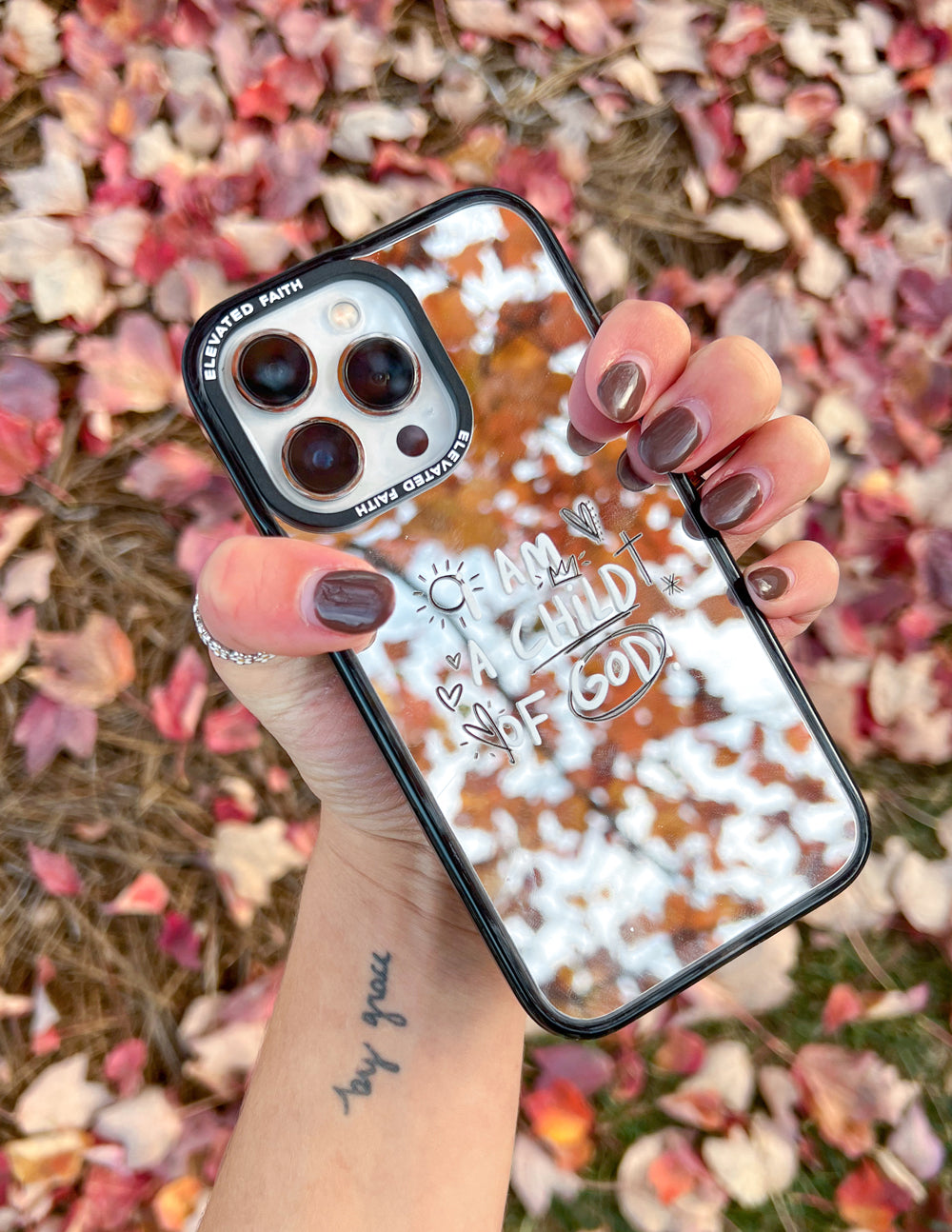 Child of God Mirror iPhone case with Bible verse John 1:12, protective and wireless charging compatible